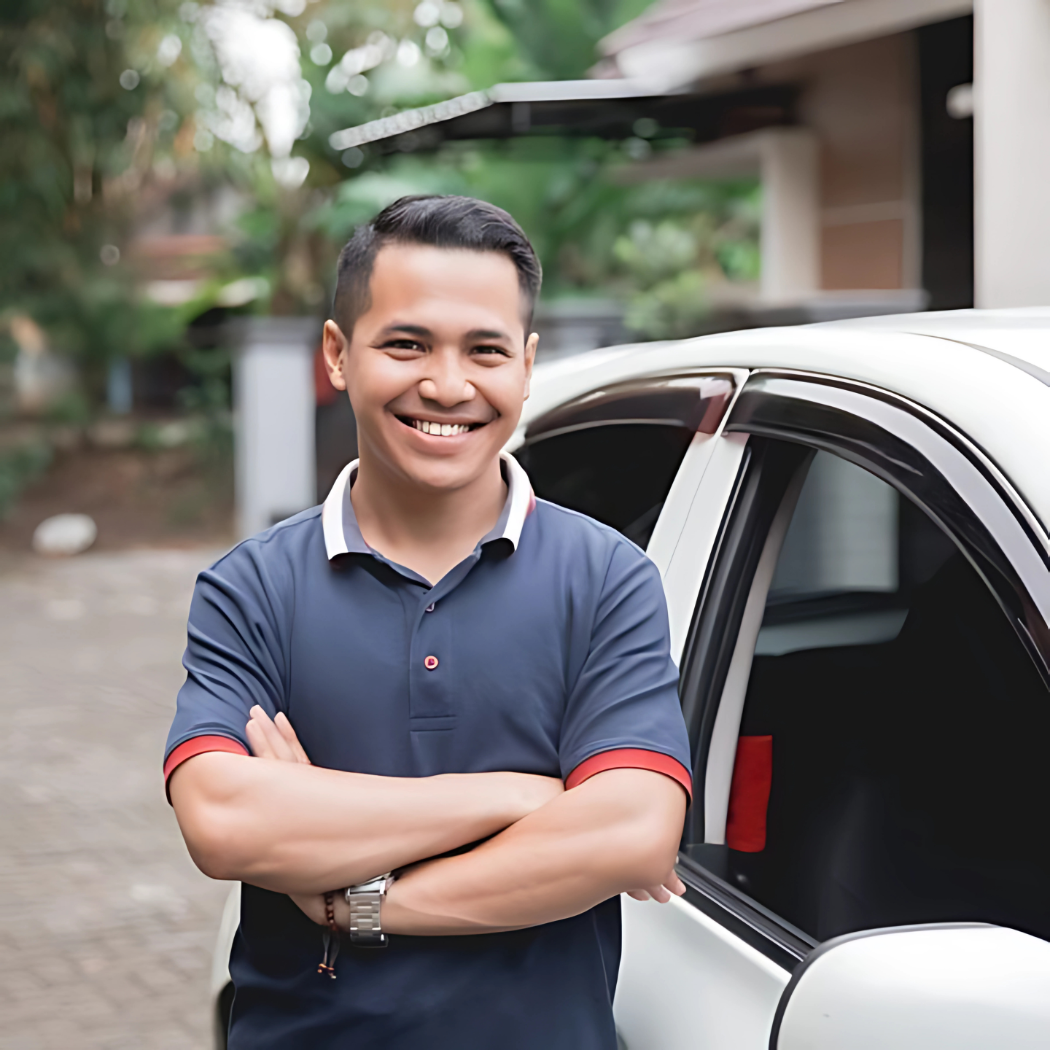 Smiling driver from local cab service