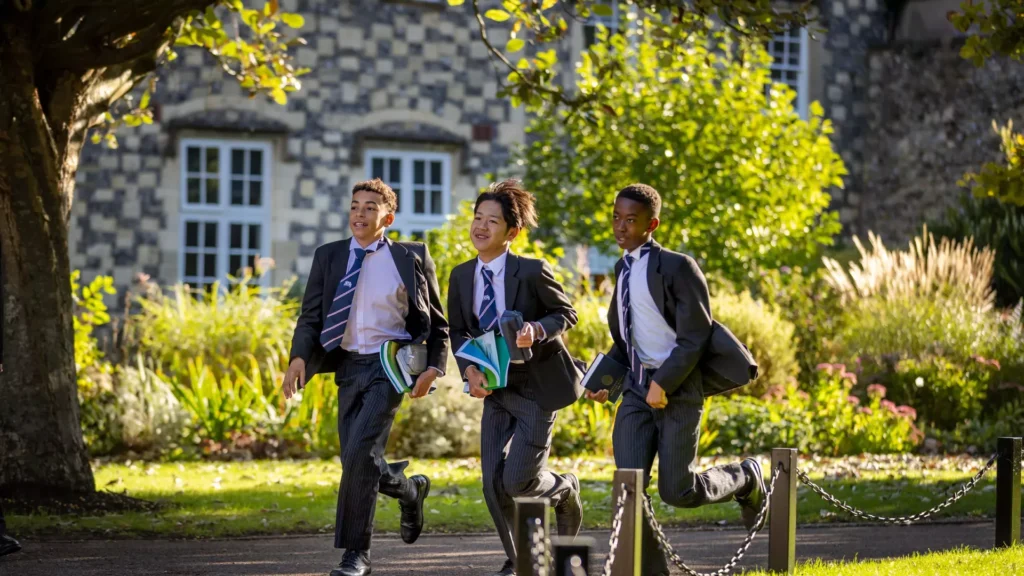 Boys heading to school using school transport services