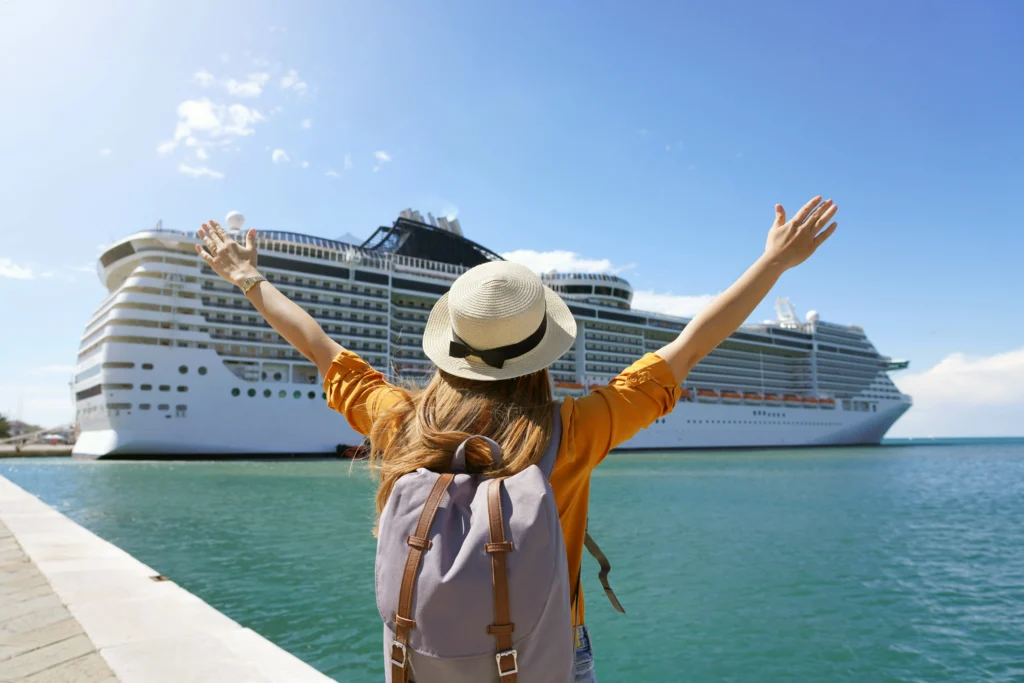 Traveler celebrating arrival after cruise ship transfers