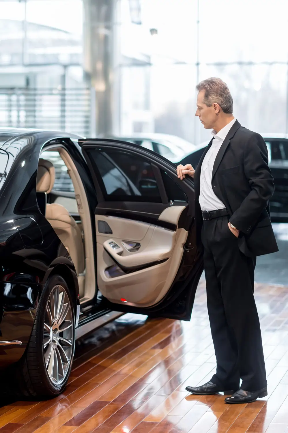driver looking a car for long distance taxi service